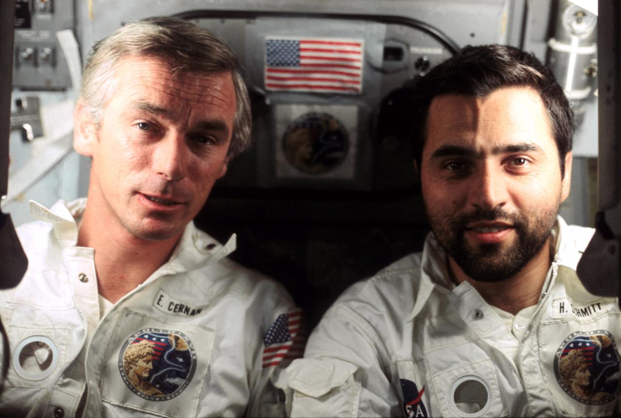 AS17-163-24148 (7-19 Dec. 1972) --- Astronaut Eugene A. Cernan (left) and scientist-astronaut Harrison H. "Jack" Schmitt are photographed by the third crew man aboard the Apollo 17 spacecraft during the final lunar landing mission in NASA's Apollo program. Astronaut Ronald E. Evans, command module pilot, took this picture. Cernan was the mission commander. Schmitt served as the lunar module pilot.