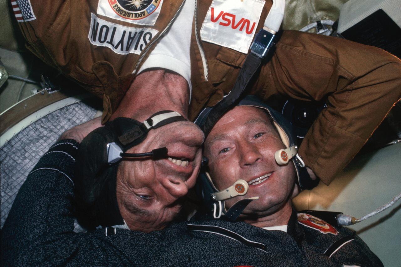 AST-05-298 (17-19 July 1975) --- Astronaut Donald K. Slayton and cosmonaut Aleksey A. Leonov are seen together in the Soyuz Orbital Module during the joint U.S.-USSR Apollo-Soyuz Test Project docking mission in Earth orbit. Slayton is the docking module pilot of the American crew. Leonov is the Soviet crew commander. This picture was taken with a 35mm camera.