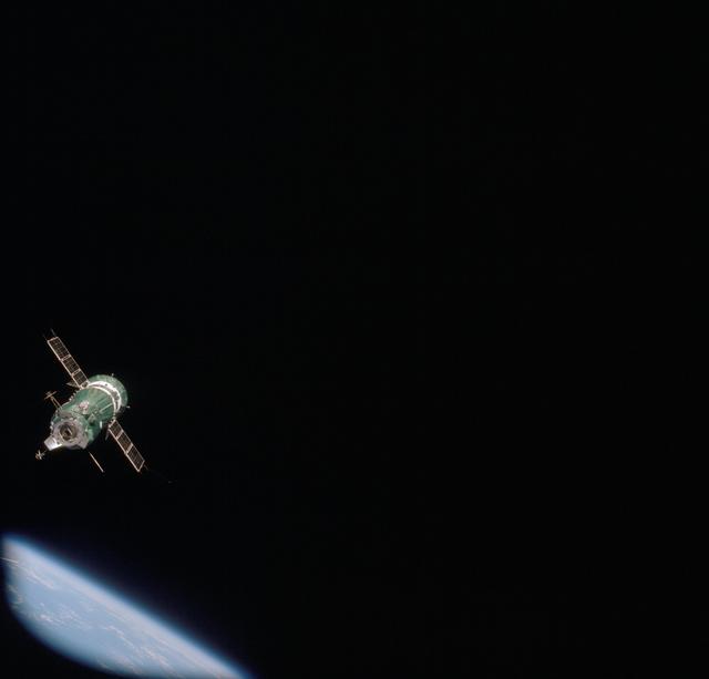 NASA image: Soviet Soyuz spacecraft contrasted against a black-sky background