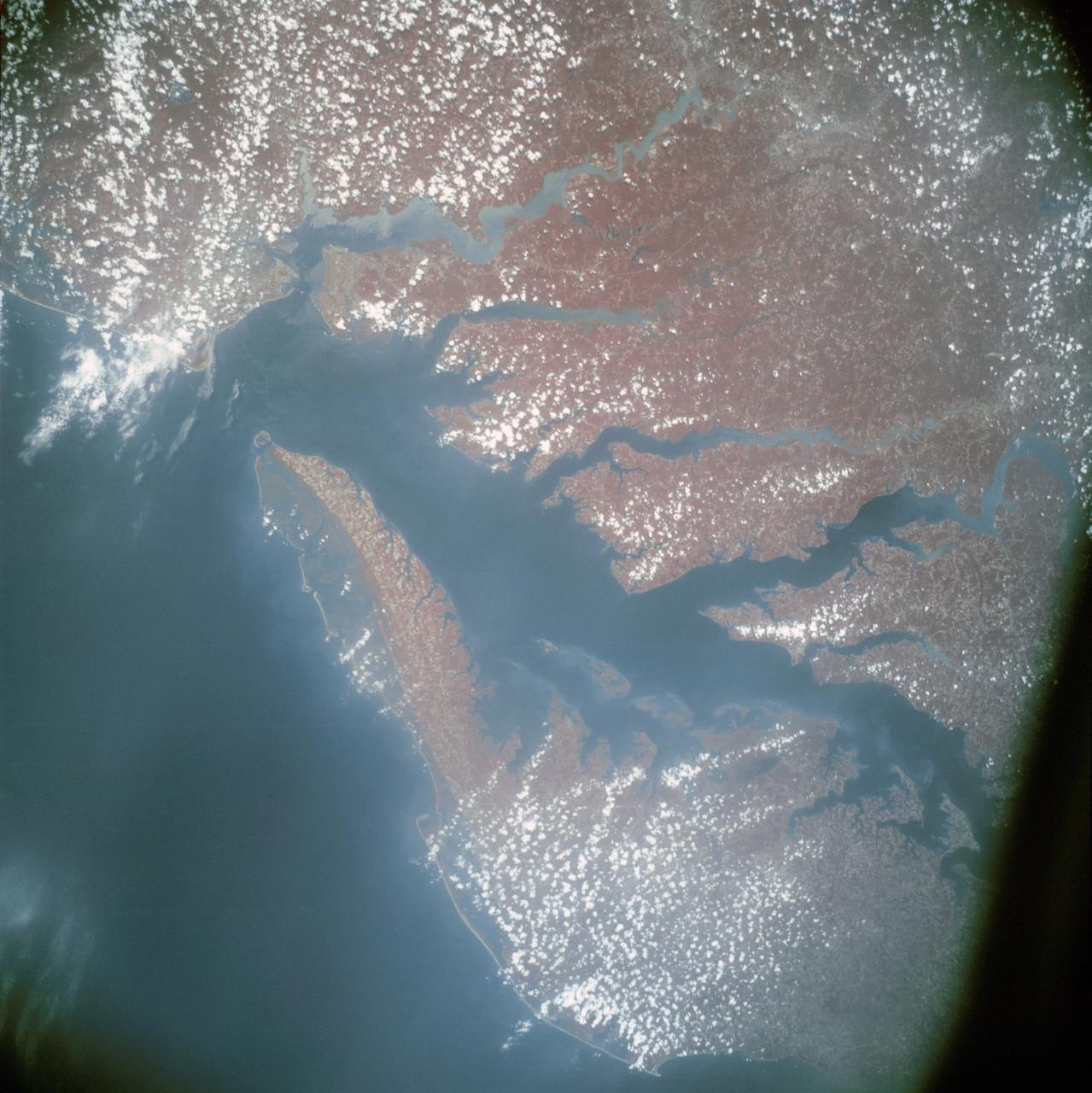 AST-13-797 (24 July 1975) --- An infrared, near vertical view of the Chesapeake Bay area showing portions of Virginia, Maryland and Delaware, as photographed from the Apollo spacecraft in Earth orbit during the joint U.S.-USSR Apollo-Soyuz Test Project mission. Richmond and Norfolk can be seen in this picture. Tidewater Virginia covers much of this view. The photograph was taken at an altitude of 217 kilometers (135 statute miles) with a 70mm Hasselblad camera using infrared Aerochrome type 2443 Ektachrome film.