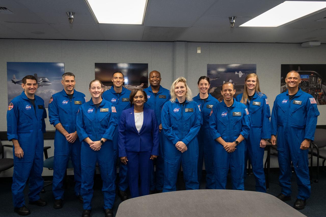 Photo Date: 12/06/2021 Subject:  NASA announced its 2021 astronaut candidate class on Dec. 6, 2021. The 10 candidates, pictured here with Johnson Center Director Vanessa Wyche in an event at Ellington Field near NASAâ€™s Johnson Space Center in Houston are Nichole Ayers, Christopher Williams, Luke Delaney, Jessica Wittner, Anil Menon, Marcos BerrÃ­os, Jack Hathaway, Christina Birch, Deniz Burnham, and Andre Douglas.   NASAâ€™s new astronaut candidates will begin about two years of training in January 2022, after which they could be assigned to missions performing research on the International Space Station, launching from American soil on spacecraft built by commercial companies, and launching on Artemis missions to the Moon on NASAâ€™s new Orion spacecraft and Space Launch System rocket. Photographers: James Blair