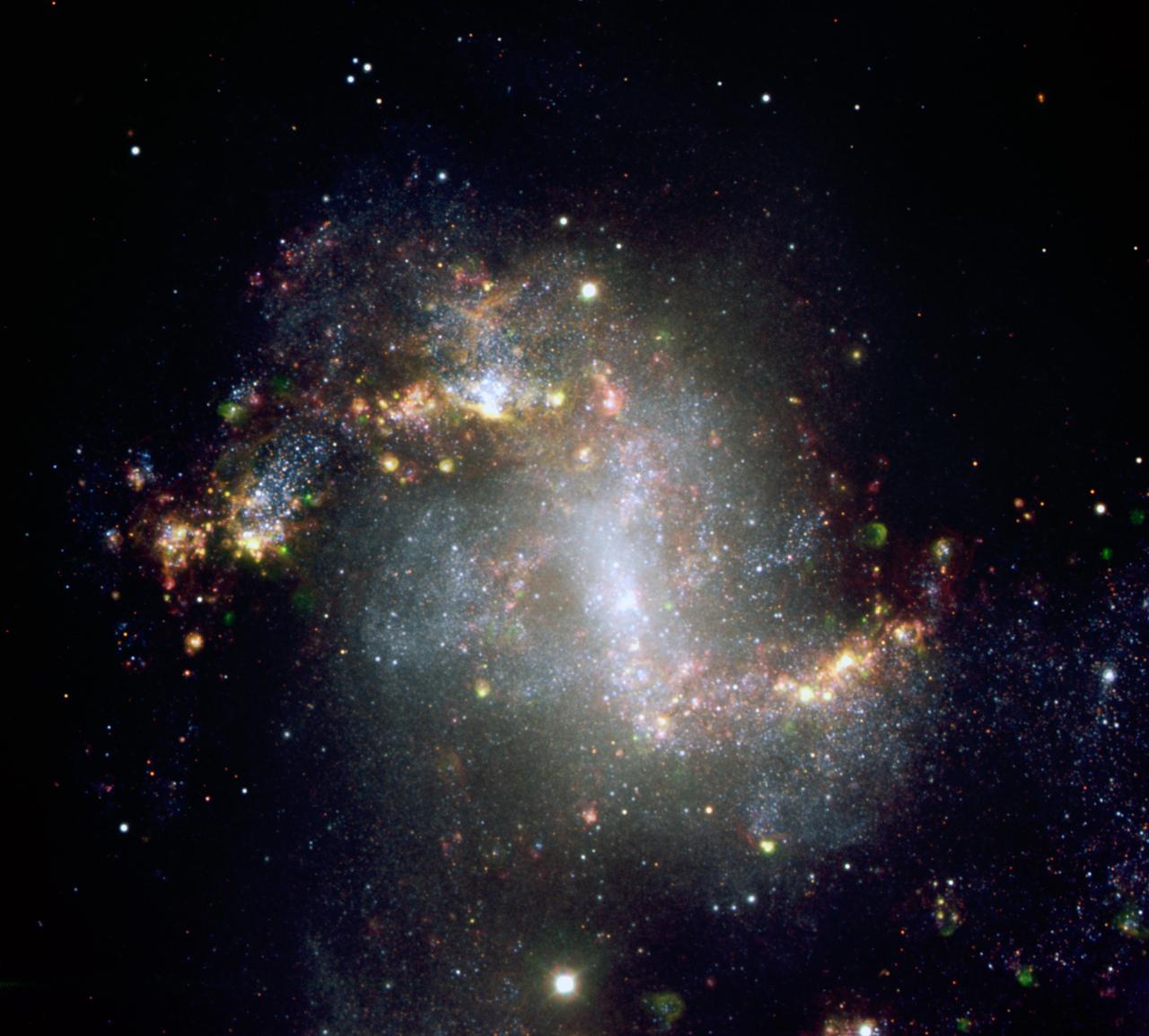 The central parts of the starburst galaxy NGC 1313. The very active state of this galaxy is evident from the image, showing many star formation regions. A great number of supershell nebulae, that is, cocoons of gas inflated and etched by successive bursts of star formation, are visible. The green nebulosities are regions emitting in the ionised oxygen lines and may harbour clusters with very hot stars. This colour-composite is based on images obtained with the FORS1 instrument on one of the 8.2-m Unit Telescope of ESO's Very Large Telescope, located at Cerro Paranal. The data were obtained in the night of 16 December 2003, through different broad- (R, B, and z) and narrow-band filters (H-alpha, OI, and OIII).