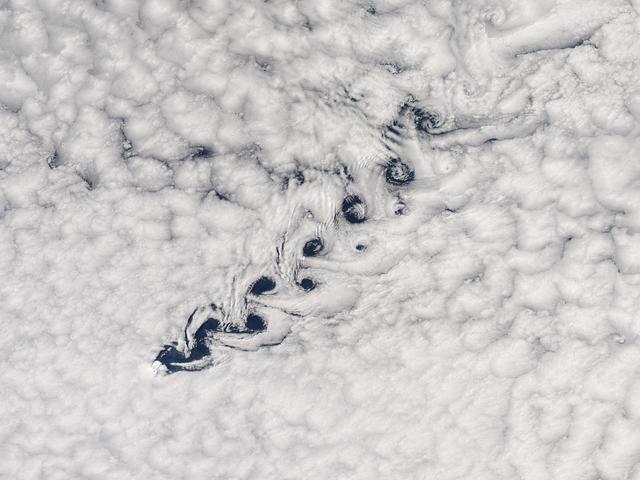 NASA image: Cloud vortices