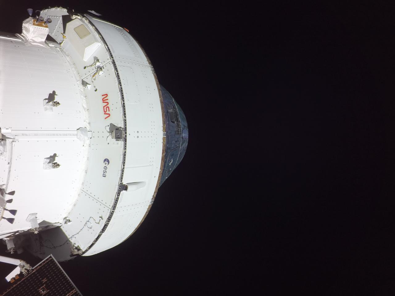 Orion snapped this high-resolution selfie in space with a camera mounted on its solar array wing during a routine external inspection of the spacecraft on the third day into the Artemis I mission.
