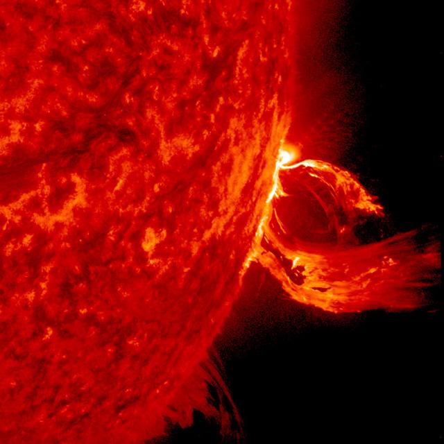 A substantial coronal mass ejection, or CME, blew out from side of the Sun, giving us a great view of the event in profile (June 17-18, 2015). NASA's Solar Dynamics Observatory caught the action in the 304 Angstrom wavelength of extreme ultraviolet light. The video clip covers about four hours of the event. While some of the plasma falls back into the Sun, a look at the coronagraph on SOHO shows a large cloud of particles heading into space.   Credit: NASA/Goddard//SDO
