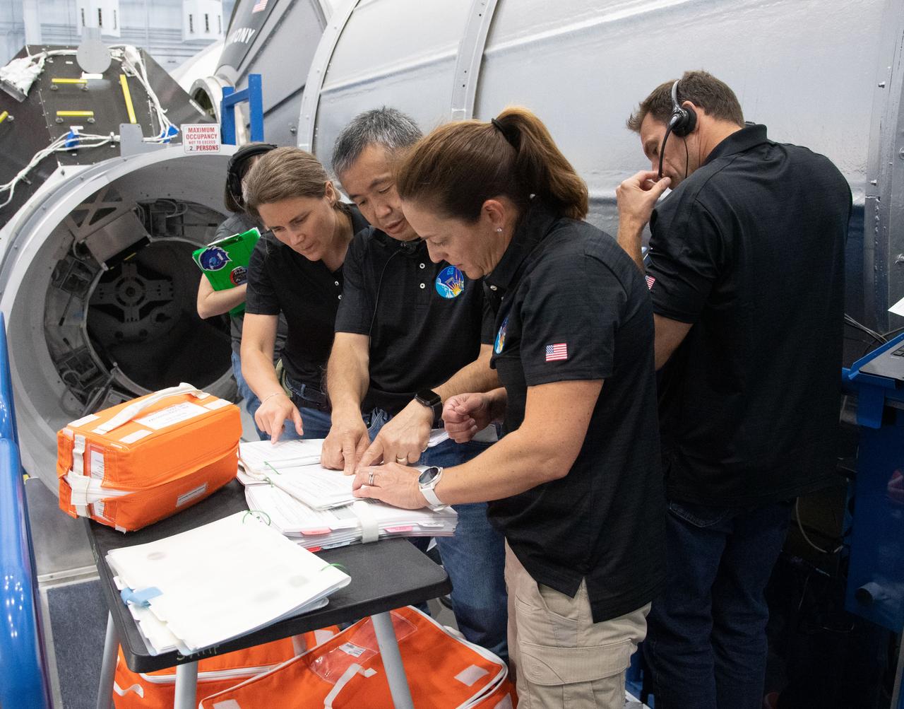 Roscosmos cosmonaut Anna Kikina, JAXA astronaut Koichi Wakata, and NASA astronaut Nicole Mann prepare for the unlikely event of an emergency before their mission to the International Space Station. Credit: NASA/James Blair