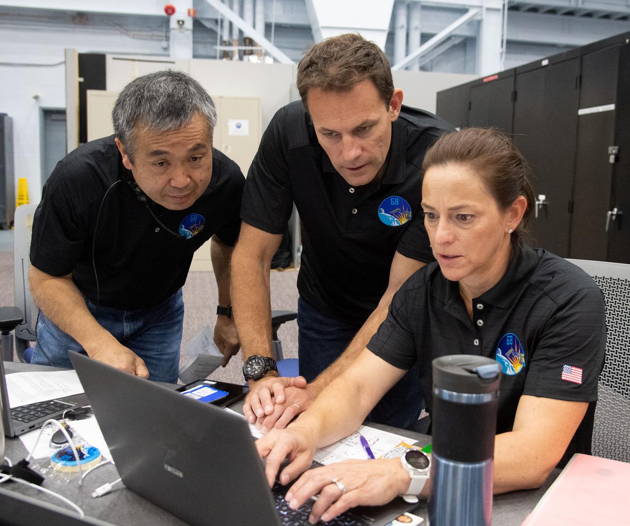NASA's SpaceX Crew-5 astronauts train on May 13, 2022 for their upcoming International Space Station mission in the Space Vehicle Mockup Facility at NASA's Johnson Space Center in Houston. From left to right: JAXA astronaut Koichi Wakata, and NASA Astronauts Josh Cassada and Nicole Mann.