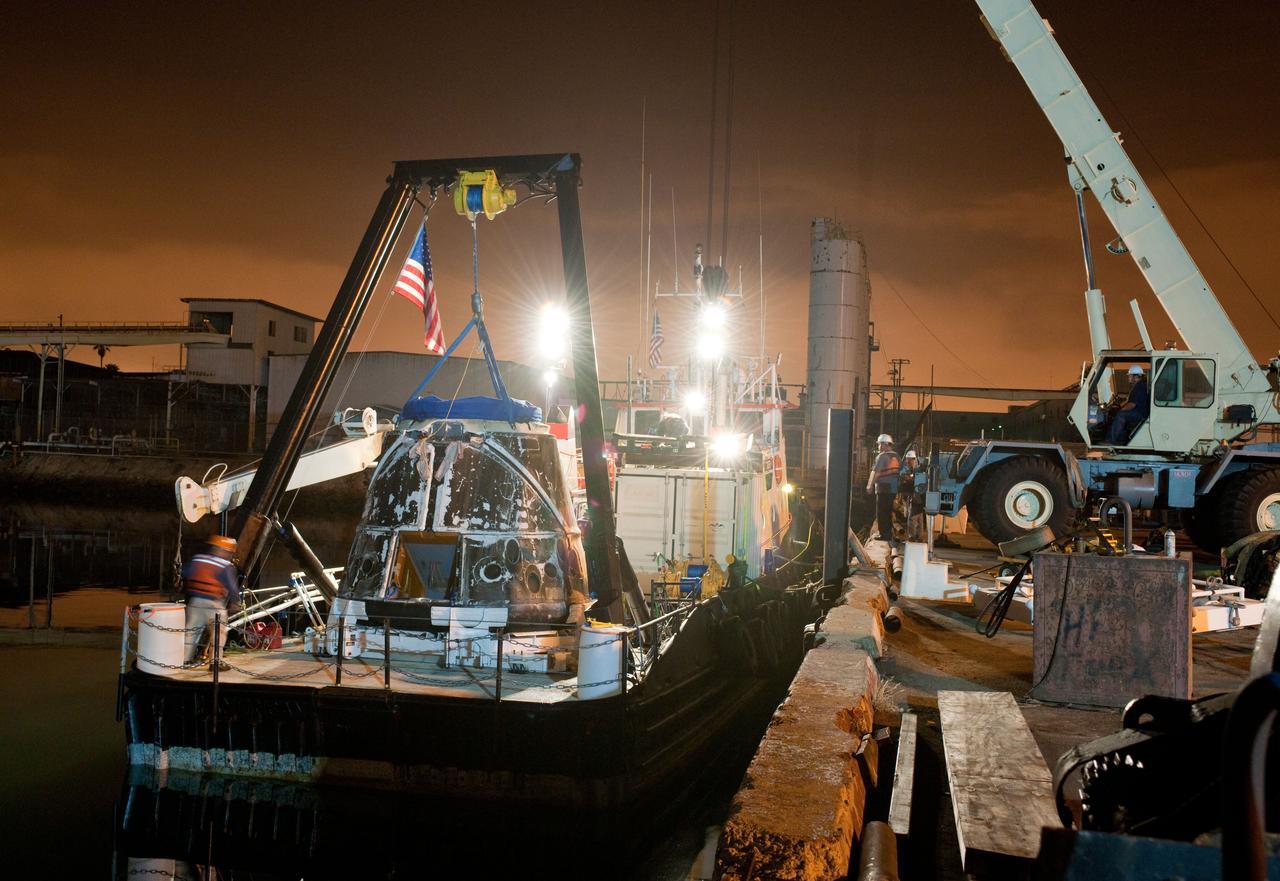 SpaceX’s Dragon capsule is seen shortly after arriving at a port near Los Angeles, Calif on Tuesday, Oct. 30, 2012. Dragon had just completed its first commercial resupply mission to the International Space Station and returned 1,673 pounds of science and supplies back to Earth.   Photo credit: NASA 