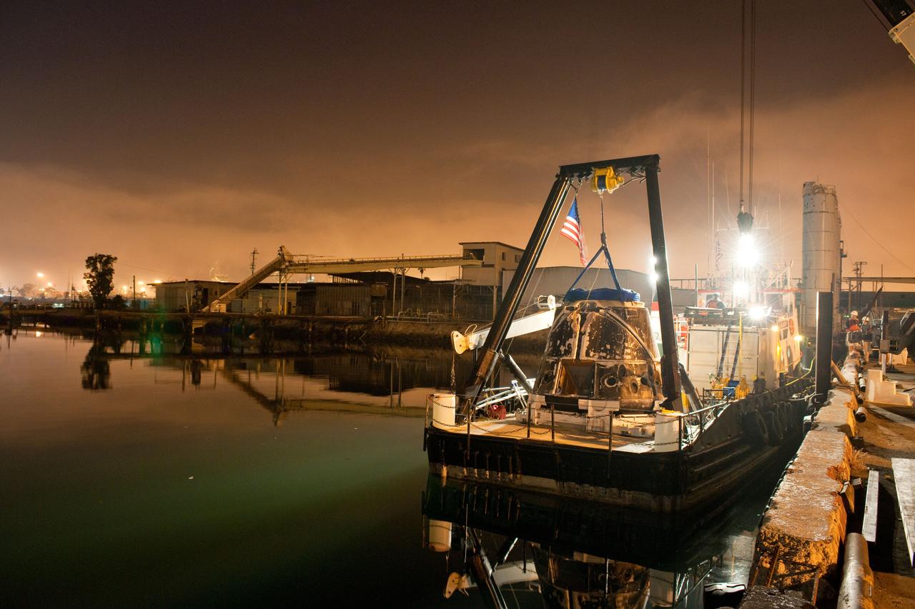 SpaceX’s Dragon capsule is seen shortly after arriving at a port near Los Angeles, Calif on Tuesday, Oct. 30, 2012. Dragon had just completed its first commercial resupply mission to the International Space Station and returned 1,673 pounds of science and supplies back to Earth.   Photo credit: NASA 