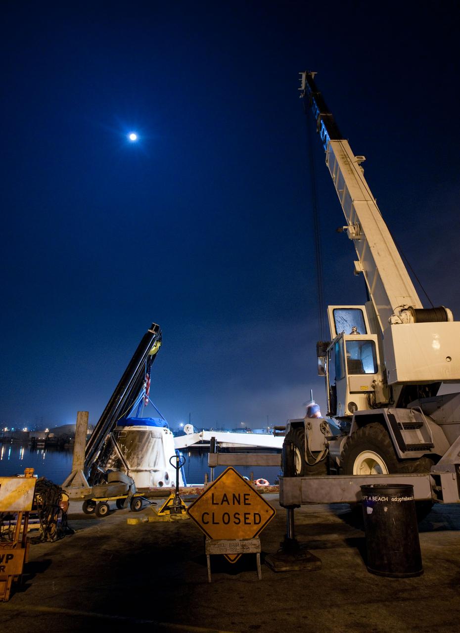 SpaceX’s Dragon capsule is seen shortly after arriving at a port near Los Angeles, Calif on Tuesday, Oct. 30, 2012. Dragon had just completed its first commercial resupply mission to the International Space Station and returned 1,673 pounds of science and supplies back to Earth.   Photo credit: NASA 
