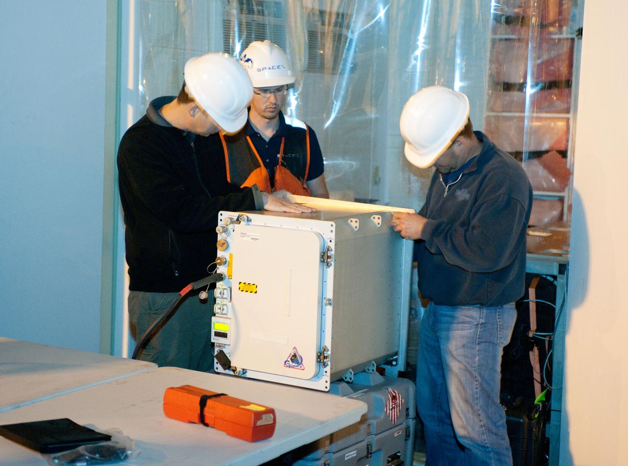 SpaceX’s Dragon capsule is seen shortly after arriving at a port near Los Angeles, Calif on Tuesday, Oct. 30, 2012. Dragon had just completed its first commercial resupply mission to the International Space Station and returned 1,673 pounds of science and supplies back to Earth.   Photo credit: NASA 