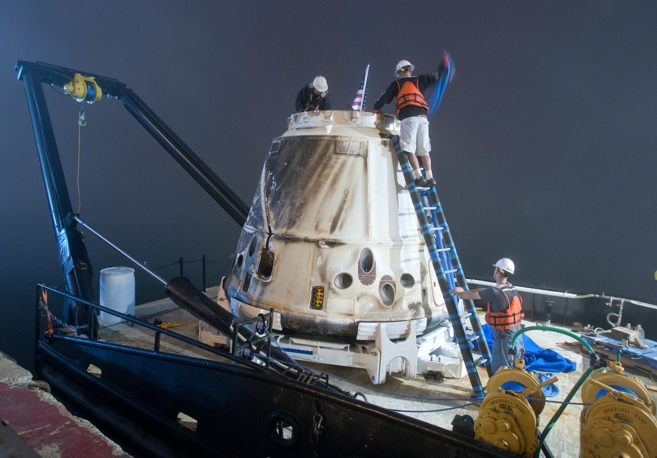 SpaceX’s Dragon capsule is seen shortly after arriving at a port near Los Angeles, Calif on Tuesday, Oct. 30, 2012. Dragon had just completed its first commercial resupply mission to the International Space Station and returned 1,673 pounds of science and supplies back to Earth.   Photo credit: NASA 