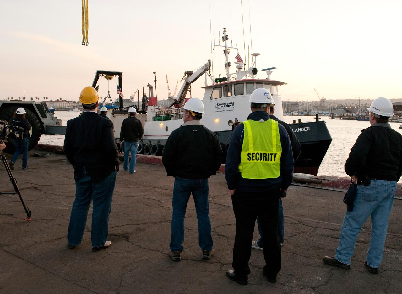ED13-0079-01 (26 March 2013) ---- SpaceX Dragon's second operational mission ended  on March 26 after three weeks attached to the International Space Station. The unmanned spacecraft splashed down  in the Pacific Ocean about 214 miles off the coast of Baja California to successfully return about 2,670 pounds of science materials from the orbital outpost.  Photo credit:  NASA