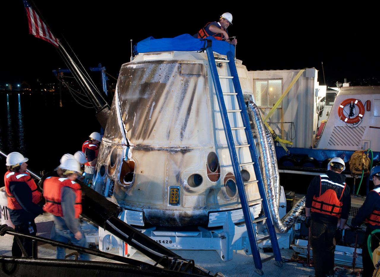 ED13-0079-06 (26 March 2013) ---- SpaceX Dragon's second operational mission ended  on March 26 after three weeks attached to the International Space Station. The unmanned spacecraft splashed down  in the Pacific Ocean about 214 miles off the coast of Baja California to successfully return about 2,670 pounds of science materials from the orbital outpost.  Photo credit:  NASA