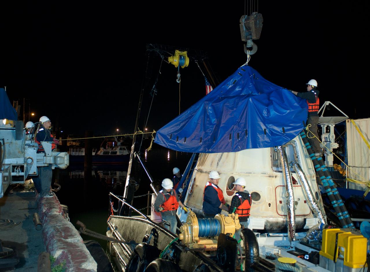 ED13-0079-13 (26 March 2013) ---- SpaceX Dragon's second operational mission ended  on March 26 after three weeks attached to the International Space Station. The unmanned spacecraft splashed down  in the Pacific Ocean about 214 miles off the coast of Baja California to successfully return about 2,670 pounds of science materials from the orbital outpost.  Photo credit:  NASA