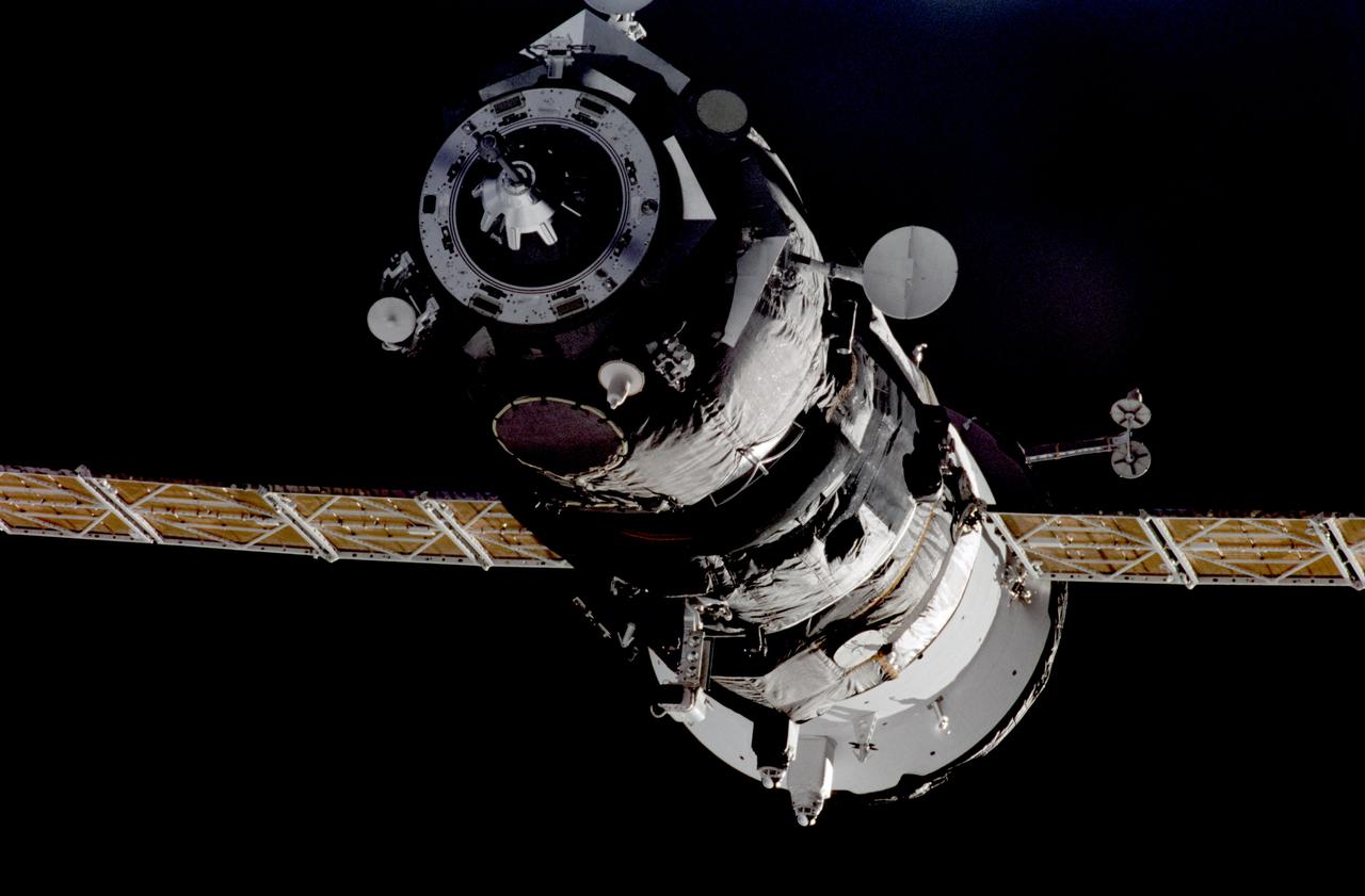 ISS01-324-002 (18 November 2000) --- A Progress supply ship linked up to the orbiting International Space Station (ISS) at 3:48 GMT, November 18, bringing Expedition 1 commander William M. Shepherd, pilot Yuri P.  Gidzenko and flight engineer Sergei K. Krikalev two tons of food, clothing, hardware and holiday gifts from their families. The photograph was taken with a 35mm camera and the film was later handed over to the STS-97 crew members   for return to Earth and subsequent processing.