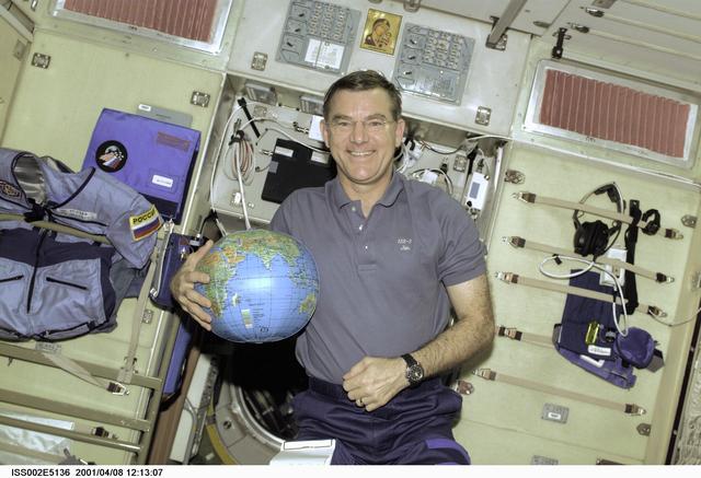 NASA image: Voss with globe in Service module
