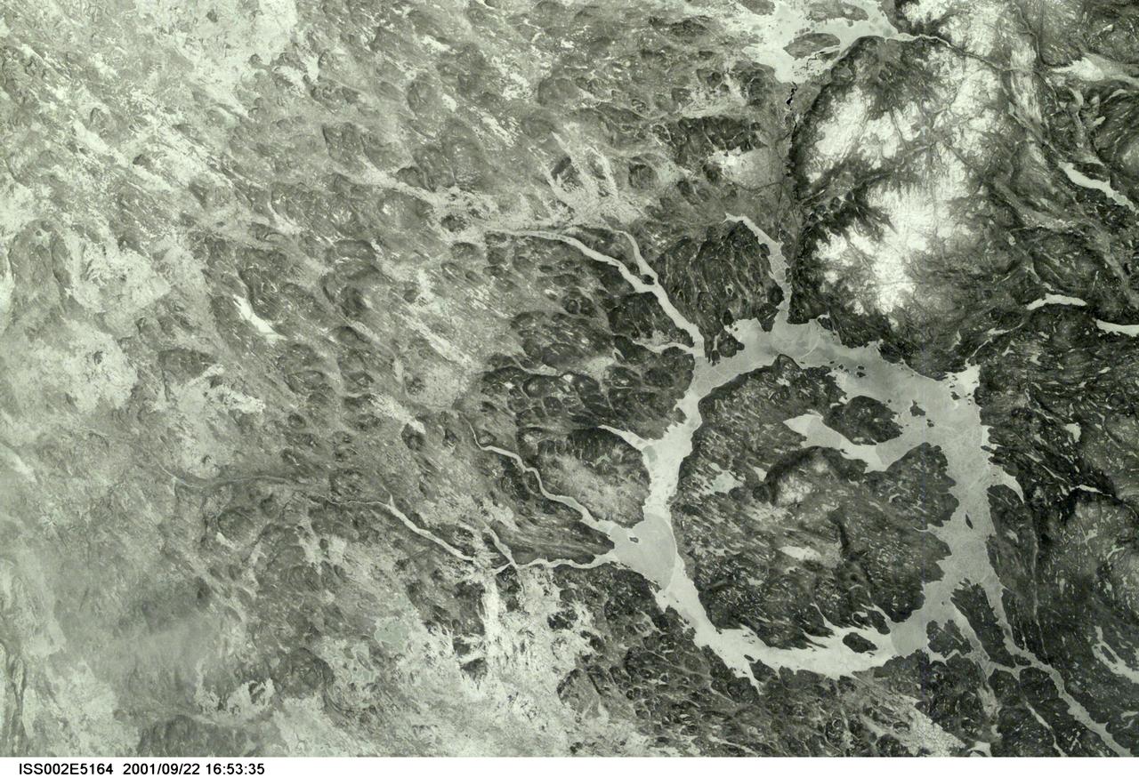 SS002-E-5164 (March 2001) --- The Manicouagan Impact Crater reservoir in Quebec, Canada, was photographed  early in the mission   by one of the Expedition Two crewmembers using a digital still camera.