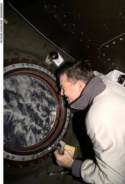 NASA image: View of Voss at photo quality window in Destiny Laboratory module