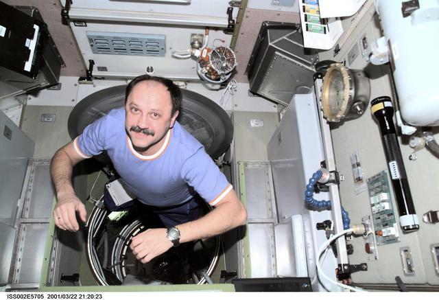NASA image: Usachev in hatch at aft end of Service module