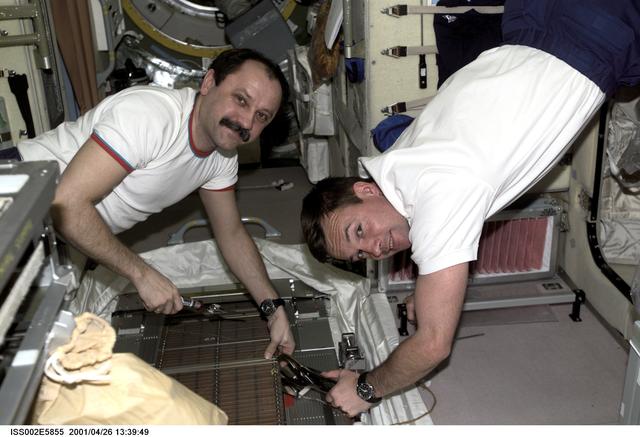 NASA image: Usachev and Lonchakov at work in the Service Module
