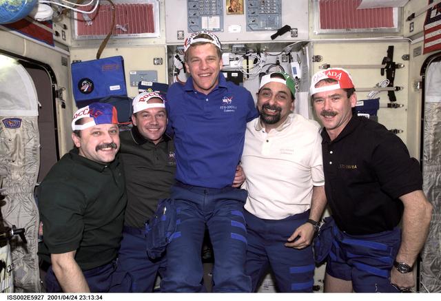 NASA image: Usachev and STS-100 crewmembers in Service Module