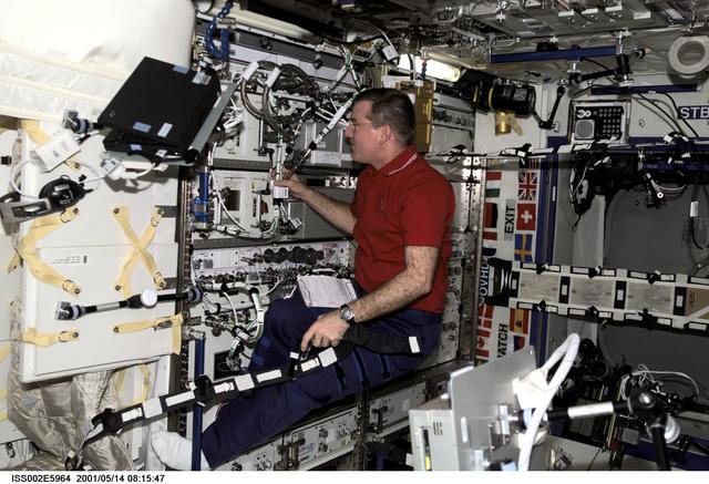 NASA image: Voss in front of Express Rack #1 in Destiny module