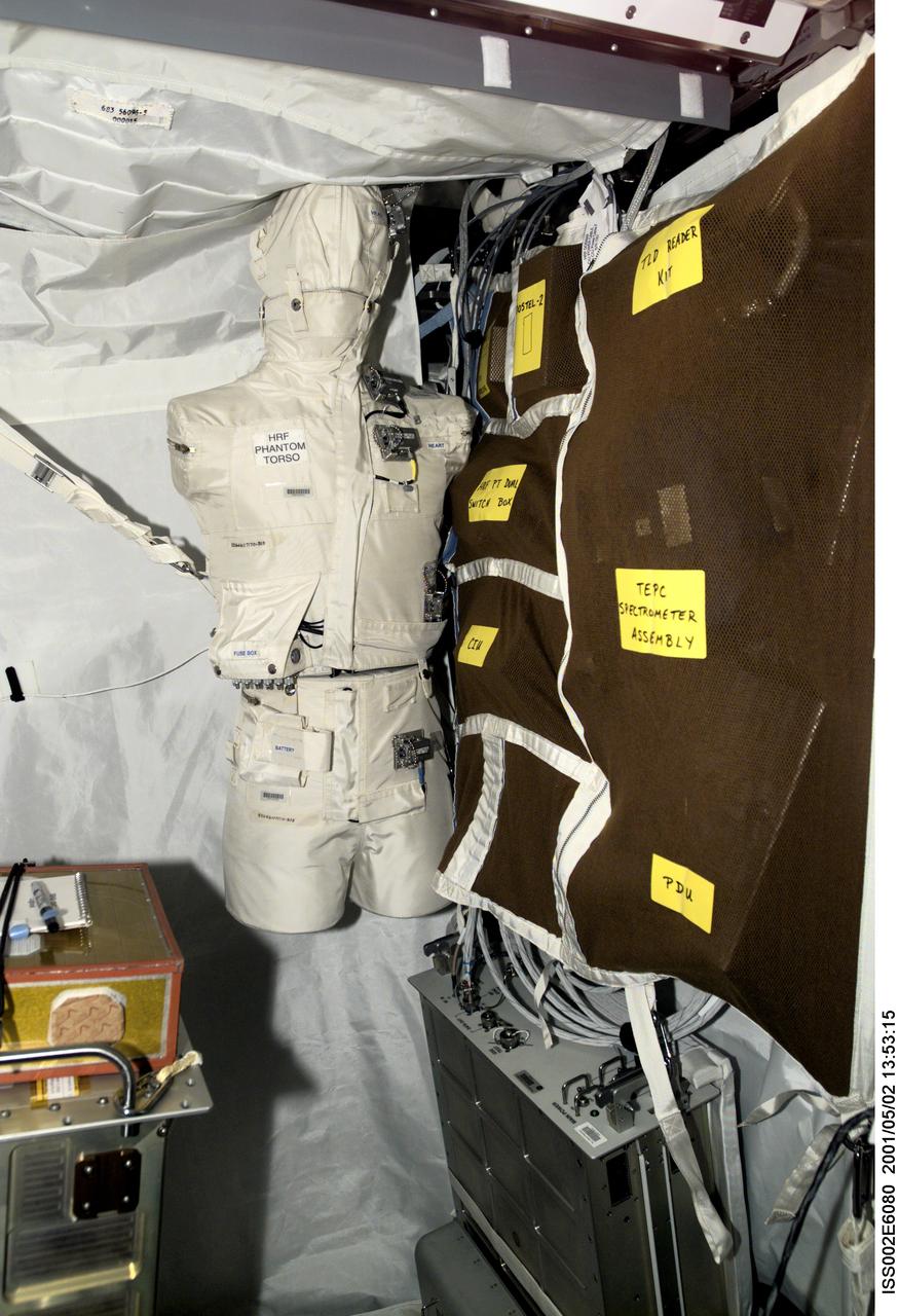 ISS002-E-6080 (2 May 2001) ---  The Phantom Torso, seen here in the Human Research Facility (HRF) section of the Destiny/U.S. laboratory on the International Space Station (ISS), is designed to measure the effects of radiation on organs inside the body by using a torso that is similar to those used to train radiologists on Earth. The torso is equivalent in height and weight to an average adult male. It contains radiation detectors that will measure, in real-time, how much radiation the brain, thyroid, stomach, colon, and heart and lung area receive on a daily basis. The data will be used to determine how the body reacts to and shields its internal organs from radiation, which will be important for longer duration space flights. The experiment was delivered to the orbiting outpost during by the STS-100/6A crew in April 2001. Dr. Gautam Badhwar, NASA JSC, Houston, TX, is the principal investigator for this experiment. A digital still camera was used to record this image.