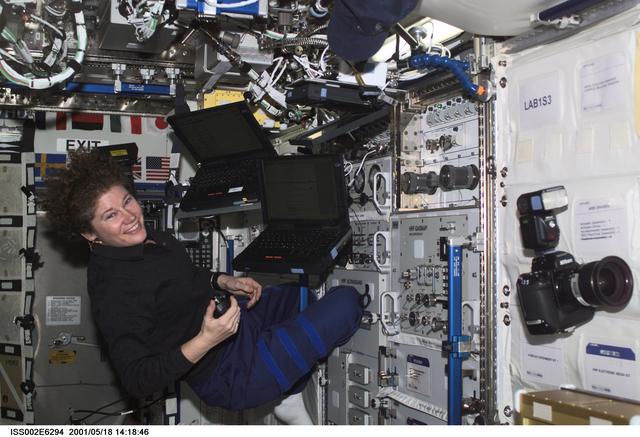 NASA image: Helms with computers at HRF rack in Destiny module