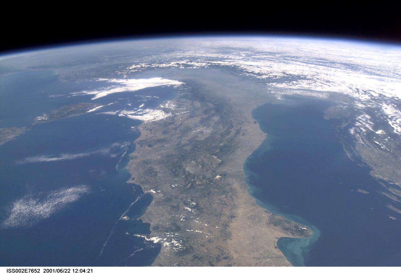 ISS002-E-7652 (22 June 2001) --- Almost a full length view of mainland Italy, with Corsica visible off the west (left) coast, was captured with a digital still camera by an Expedition Two crew member aboard the International Space Station (ISS).