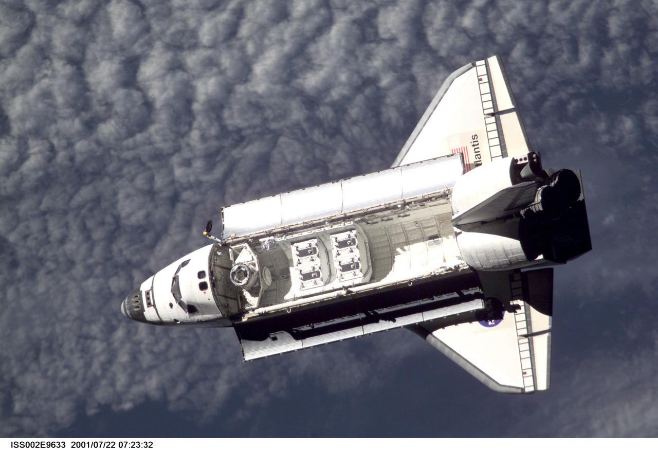 ISS002-E-9633 (21 July 2001) --- View of the Space Shuttle Atlantis after it undocked from the International Space Station (ISS) during the STS-104 mission. The STS-104 crew delivered the Quest Airlock to the ISS during the twelve day mission. This image was recorded by an Expedition Two crew member with a digital still camera.