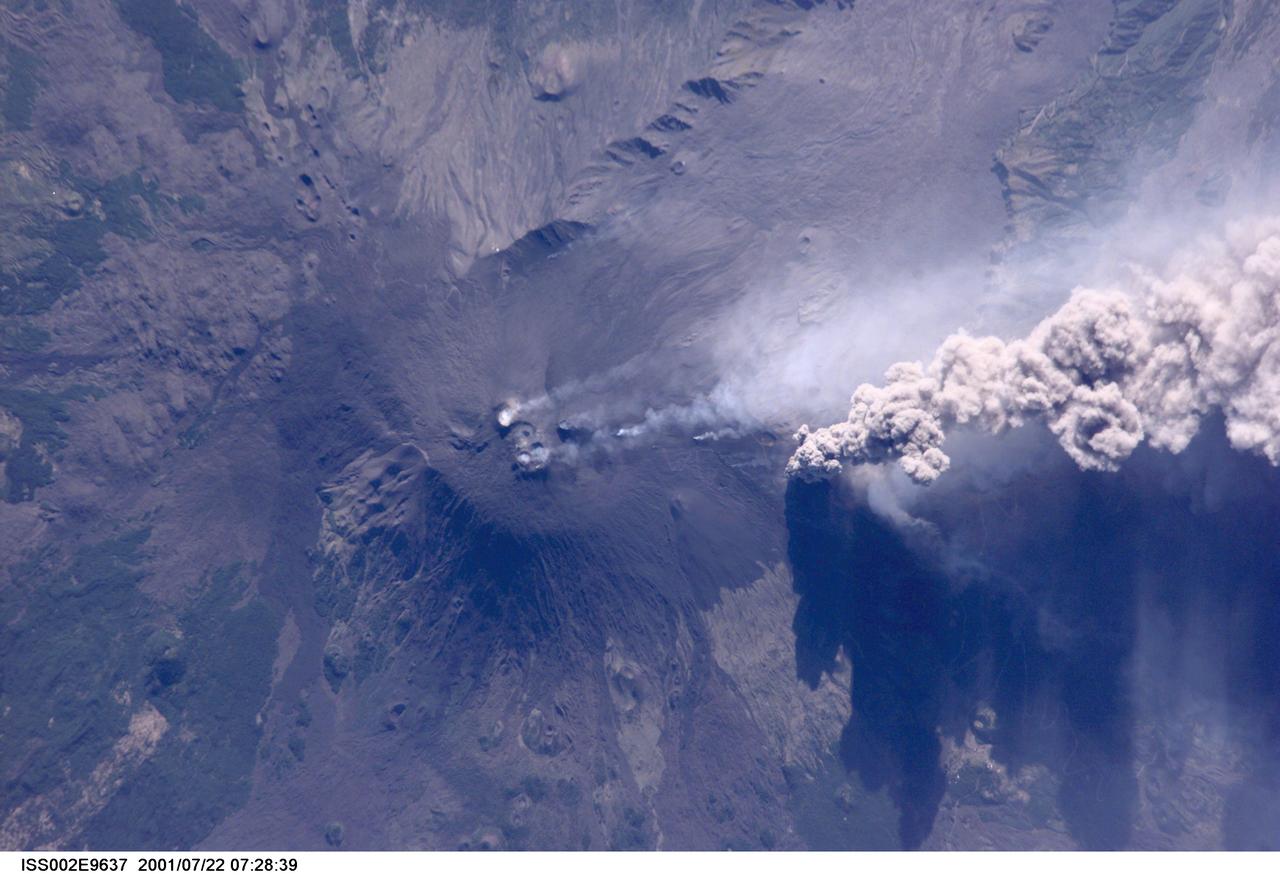 ISS002-E-9637 (22 July 2001) --- An overhead look at the smoke and ash being expelled from the erupting volcano Mt. Etna on the island of Sicily.  This image was recorded by an Expedition Two crew member with a digital still camera.