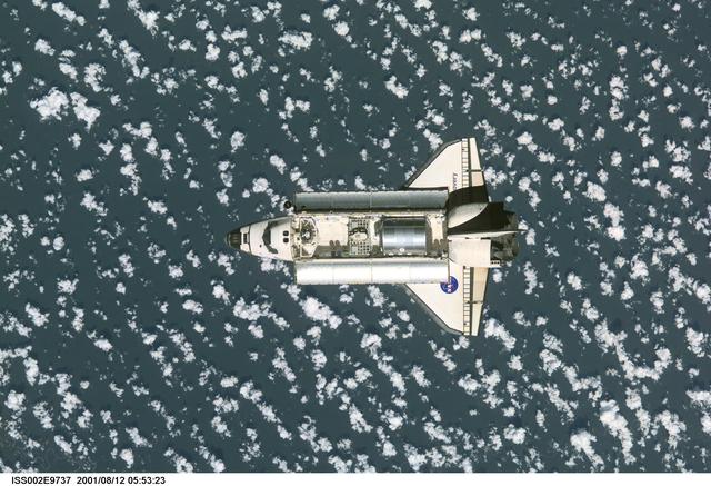 STS-105 orbiter Discovery on approach for docking with ISS