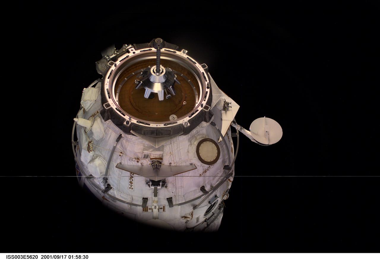 ISS003-E-5620 (16 September 2001) ---  The Russian Docking Compartment, named Pirs (the Russian word for pier), is only seconds away from docking with the International Space Station (ISS).  One of the Expedition Three crew members, using a digital still camera with a 35mm lens, recorded the image from onboard the orbital outpost. The vehicle was launched on September 14, 2001 and docking occurred on September 16.