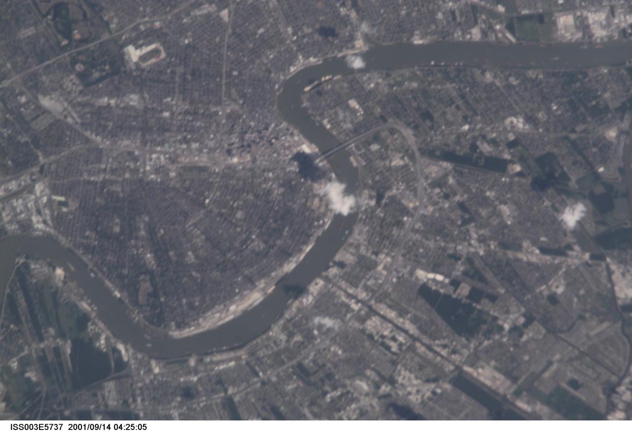 ISS003-E-5737 (14 September 2001) --- One of the Expedition Three crew members aboard the International Space Station (ISS) used a 400mm lens (with an extender to achieve an 800mm effect) to record this digital still camera's nadir view of Greater New Orleans. The French Quarter and the Superdome are left and just above the center point in the frame.