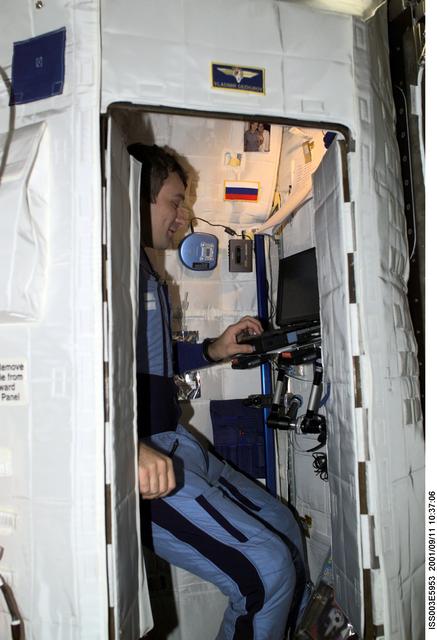 Dezhurov works in the TESS in the U.S. Laboratory during Expedition Three
