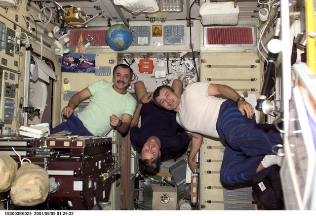 NASA image: Culbertson, Tyurin and Dezhurov pose in Zvezda during Expedition Three