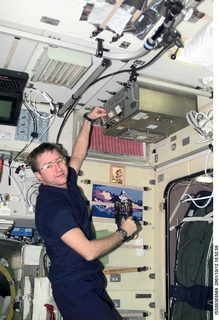 NASA image: Culbertson operates the TOCA hardware in Zvezda during Expedition Three