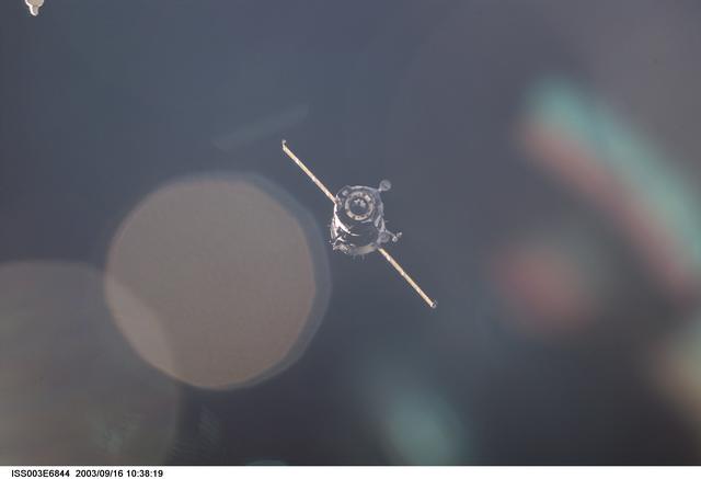 NASA image: View of the approach of the Soyuz carrying the Taxi crew taken during Expedition Three
