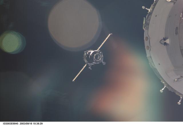 NASA image: View of the approach of the Soyuz carrying the Taxi crew taken during Expedition Three