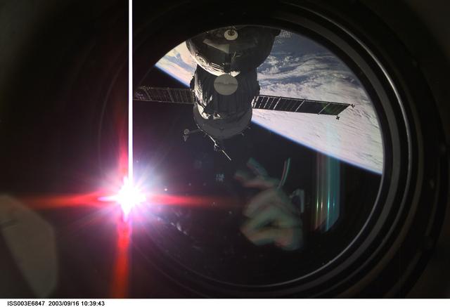 NASA image: View of the approach of the Soyuz carrying the Taxi crew taken during Expedition Three