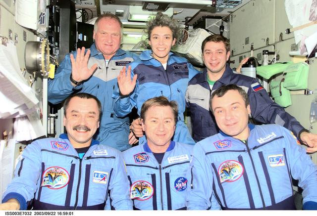 NASA image: Taxi and Expedition Three crews pose for a group photo in Zvezda during Expedition Three