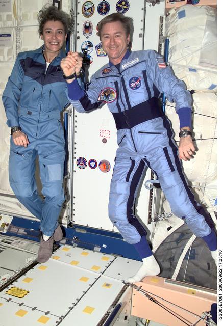 NASA image: Haignere and Culbertson pose in Node 1 during Expedition Three
