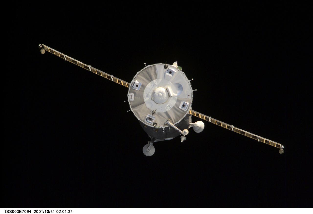 ISS003-E-7094 (31 October 2001) --- A Soyuz spacecraft departs from the International Space Station (ISS) carrying the Soyuz taxi crew, Commander Victor Afanasyev, Flight Engineer Konstantin Kozeev and French Flight Engineer Claudie Haignere, ending their eight-day stay on the station. Afanasyev and Kozeev represent Rosaviakosmos, and Haignere represents ESA, carrying out a flight program for CNES, the French Space Agency, under a commercial contract with the Russian Aviation and Space Agency. This image was taken with a digital still camera.