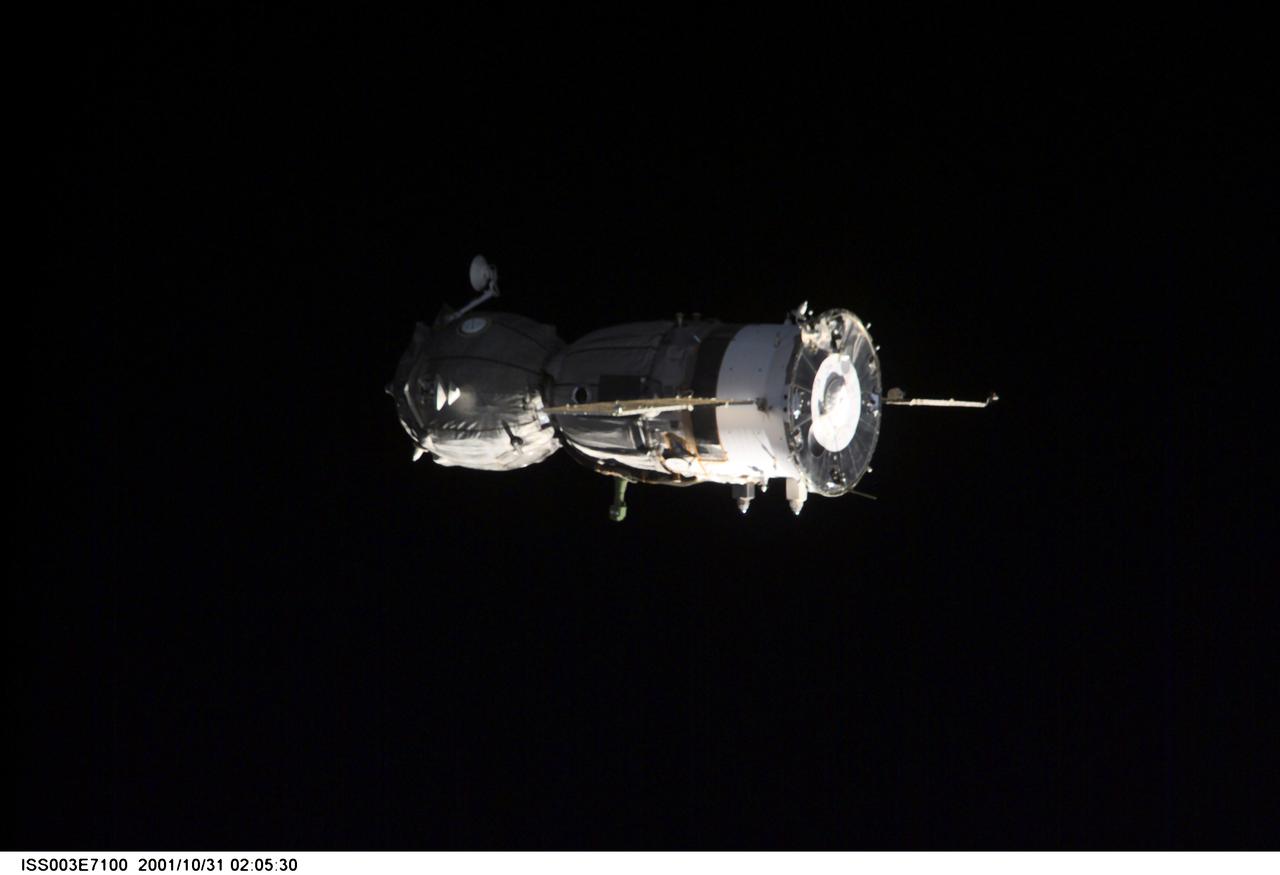 ISS003-E-7100 (31 October 2001) --- A Soyuz spacecraft departs from the International Space Station (ISS) carrying the Soyuz taxi crew, Commander Victor Afanasyev, Flight Engineer Konstantin Kozeev and French Flight Engineer Claudie Haignere, ending their eight-day stay on the station. Afanasyev and Kozeev represent Rosaviakosmos, and Haignere represents ESA, carrying out a flight program for CNES, the French Space Agency, under a commercial contract with the Russian Aviation and Space Agency. This image was taken with a digital still camera.