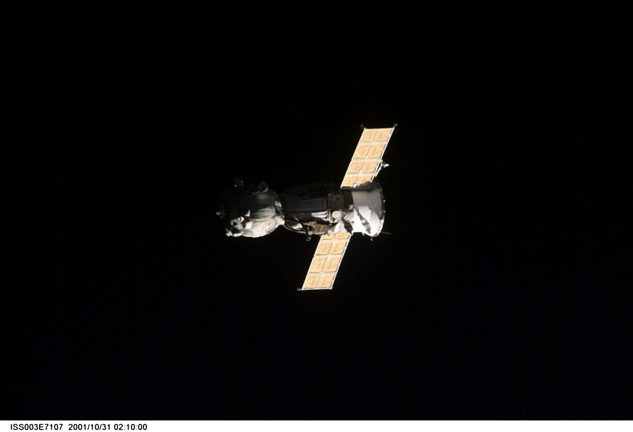 ISS003-E-7107 (31 October 2001) --- A Soyuz spacecraft departs from the International Space Station (ISS) carrying the Soyuz taxi crew, Commander Victor Afanasyev, Flight Engineer Konstantin Kozeev and French Flight Engineer Claudie Haignere, ending their eight-day stay on the station. Afanasyev and Kozeev represent Rosaviakosmos, and Haignere represents ESA, carrying out a flight program for CNES, the French Space Agency, under a commercial contract with the Russian Aviation and Space Agency. This image was taken with a digital still camera.