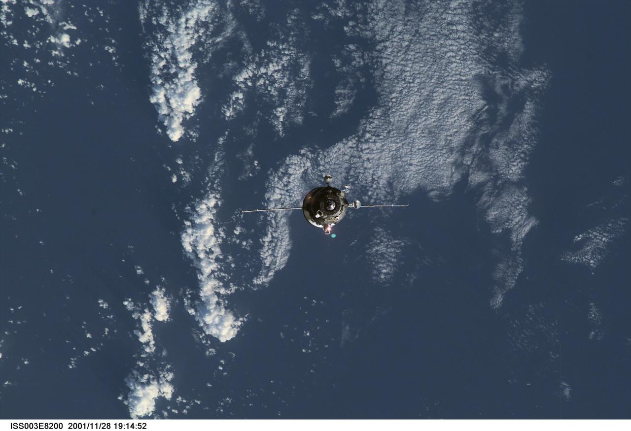 View of a Progress spacecraft before docking with the ISS during Expedition Three