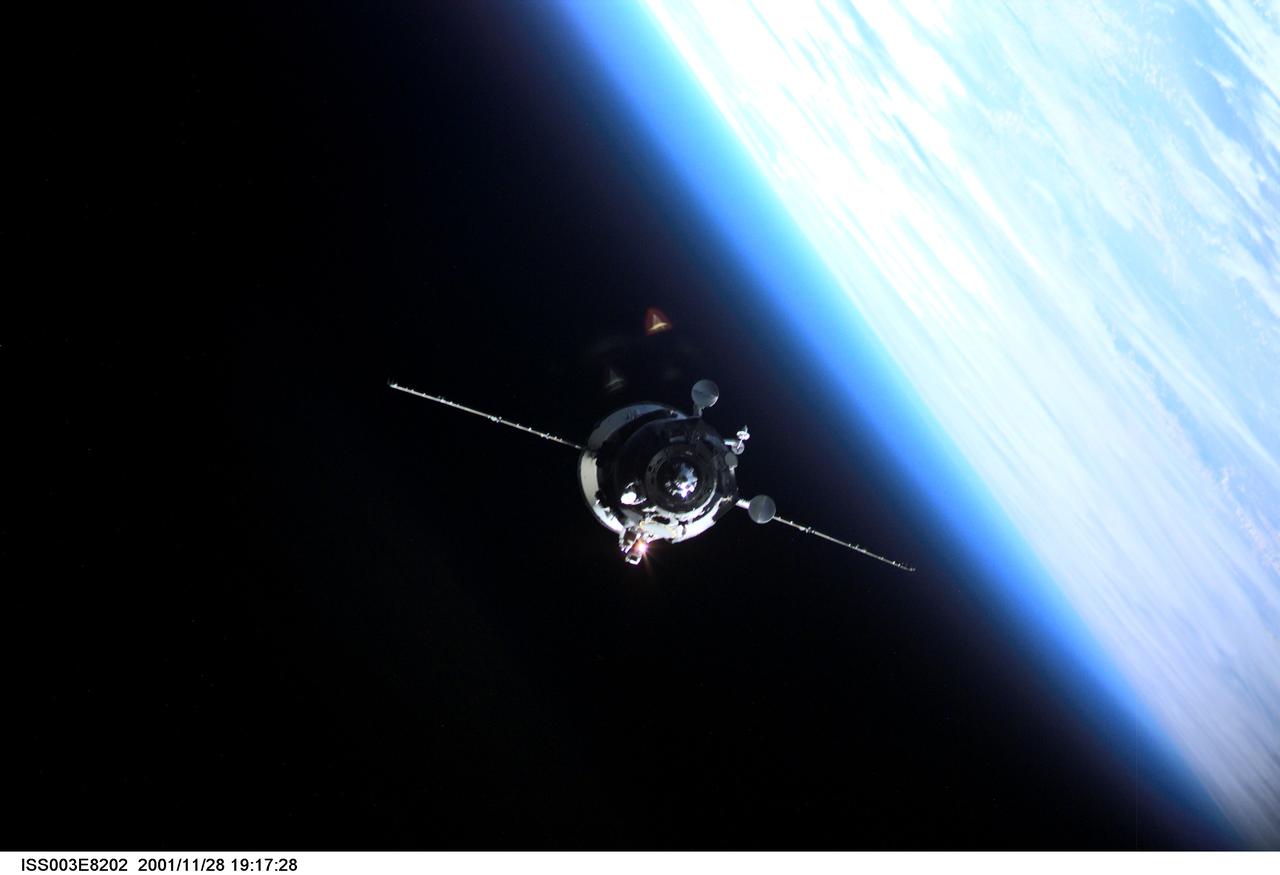 View of a Progress spacecraft before docking with the ISS during Expedition Three