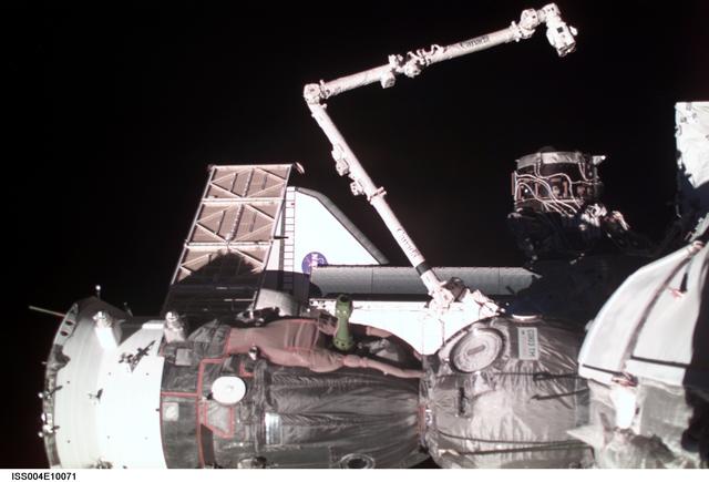 View of Soyuz, SSRMS, PMA3 and Atlantis taken prior to undocking during Expedition Four