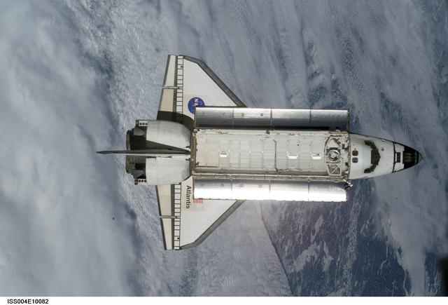 NASA image: STS-110 Shuttle Atlantis separates from the ISS following undocking, Expedition Four